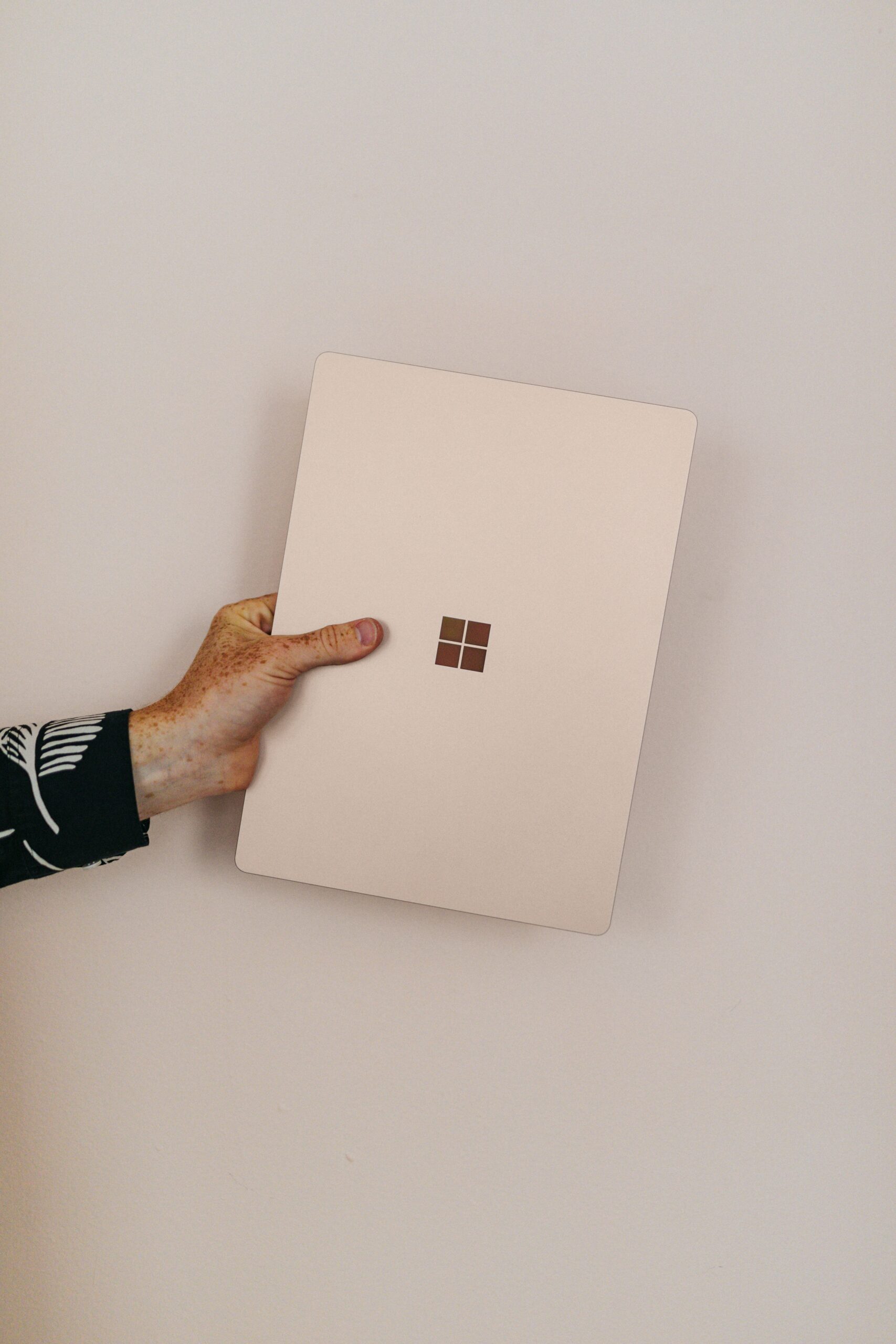 person holding sandstone microsoft